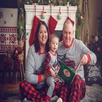 Zukuco podudaranje porodičnih pidžama postavlja božićno PJ slovo ispisa vrh i plaćene hlače za spavanje